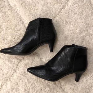 Baby heeled, pointed toe, faux snake skin booties.
